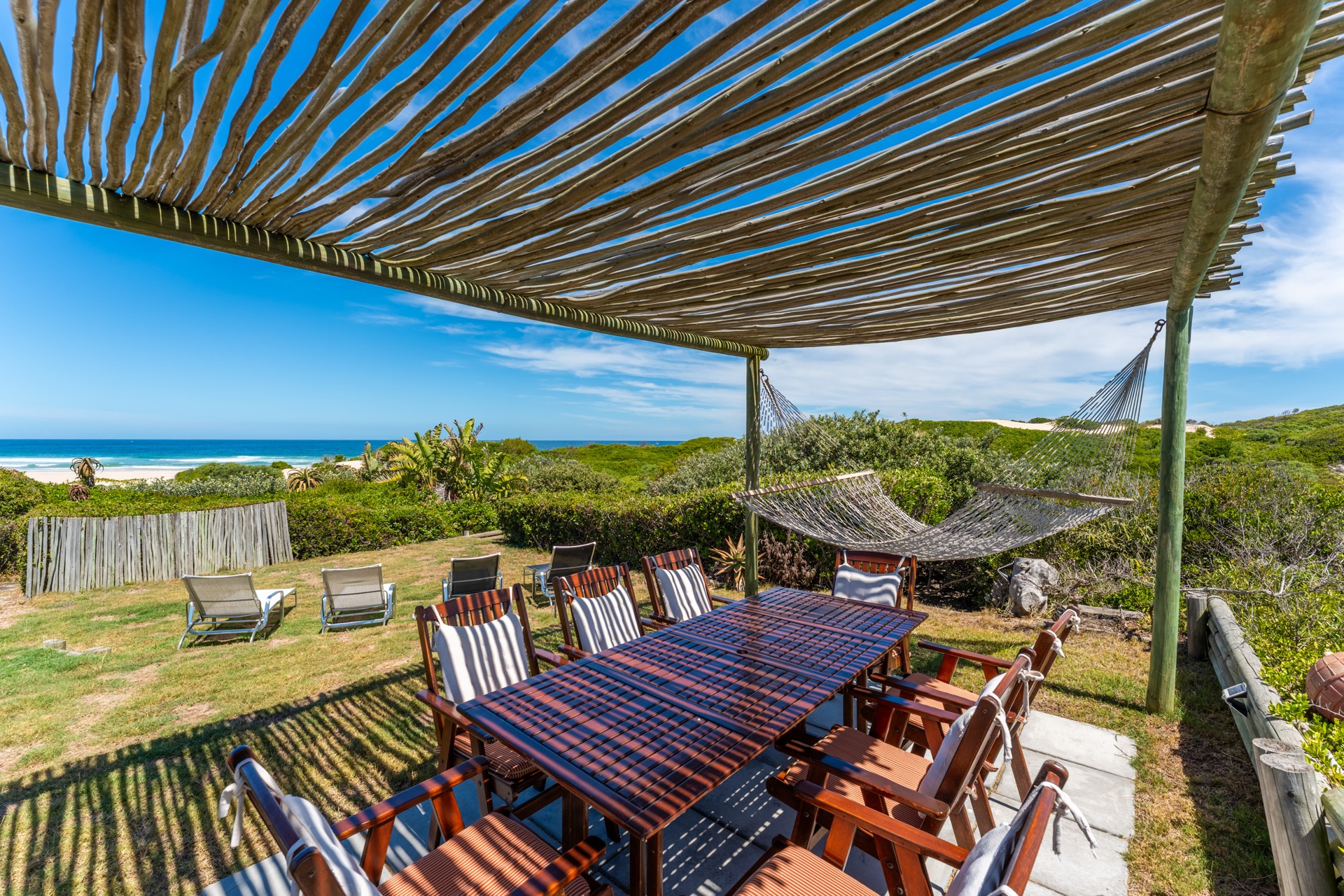 Outdoor dining with ocean view at Cape St Francis